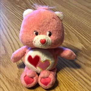 Pink Carebears with Two hearts on belly.